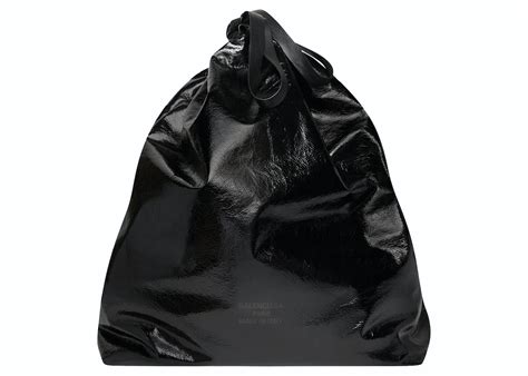 balenciaga trash pouch.